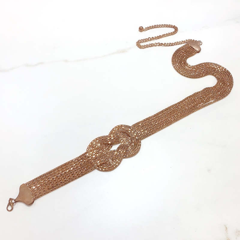 Cinturon cadena forma nudo ocho